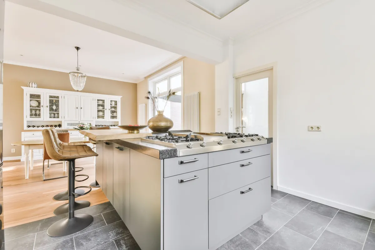 Open plan interior with painted walls and ceiling running through to the living space.