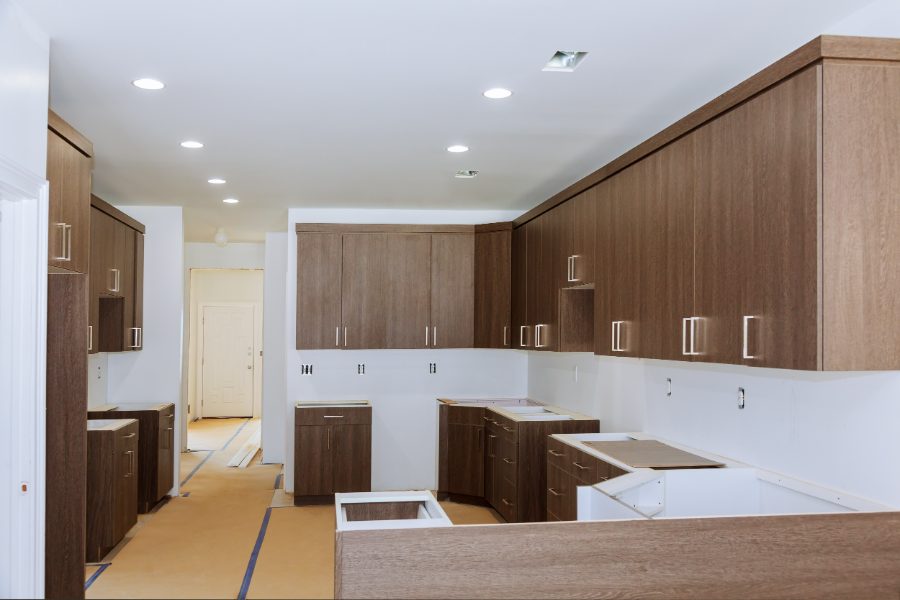 Refinished kitchen cabinet doors sprayed in a smooth white finish