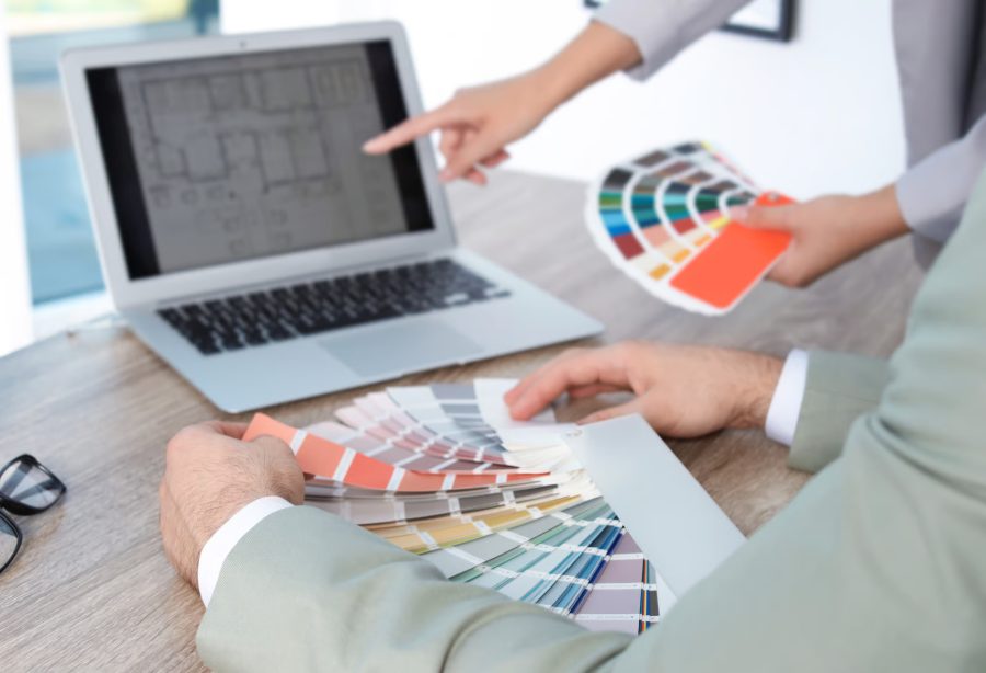 Paint color swatches laid out during a color consultation