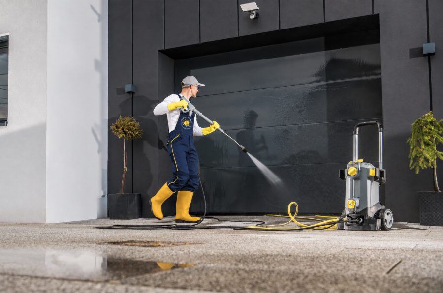 Pressure cleaning a paver driveway at a Boca Raton home